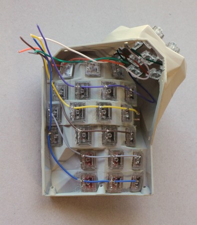 A stage in wiring up the right-hand key clusters of a Concertina v0.7.0, joining the two clusters where the columns cross them.