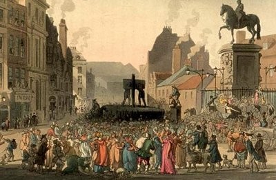 Gravyr i färg av skampåle (pillory) vid Charing Cross 1808, av Augustus Pugin och Thomas Rowlandson för Ackermanns “Microcosm of London” (1808-11).