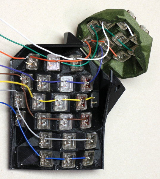 The second stage of wiring up the right-hand key clusters, joining the two clusters where the columns cross them.