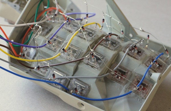 Diodes bent and soldered to start connecting rows of keys on the right-hand side of a Concertina v0.7.0.