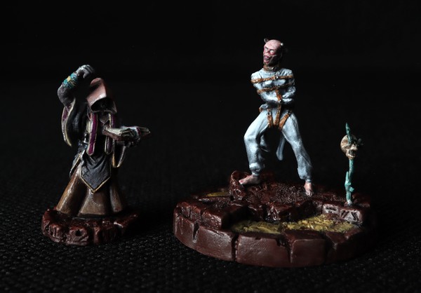 An Acolyte Cultist and a converted High Priest.