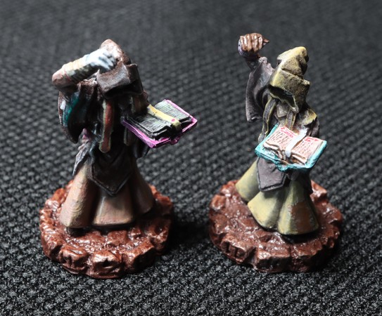 Variations in my paint job of the Daemon Sultan faction Acolytes.