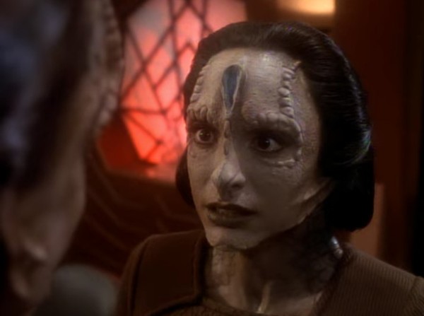 Nana Visitor in “Second Skin” (1994), with Gregory Sierra turned away from the camera.