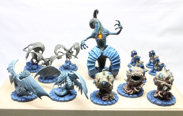 All of the faction’s models on top of their box, for comparison with the unpainted version.