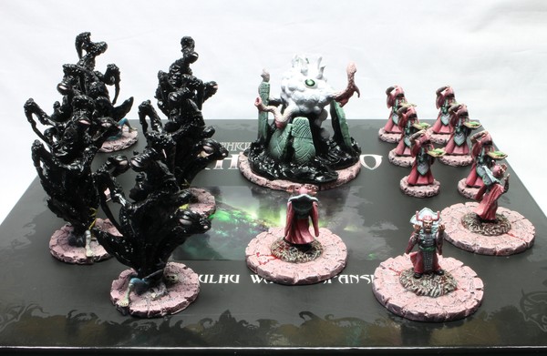 All of the faction’s models on top of their box, for comparison with the unpainted version.