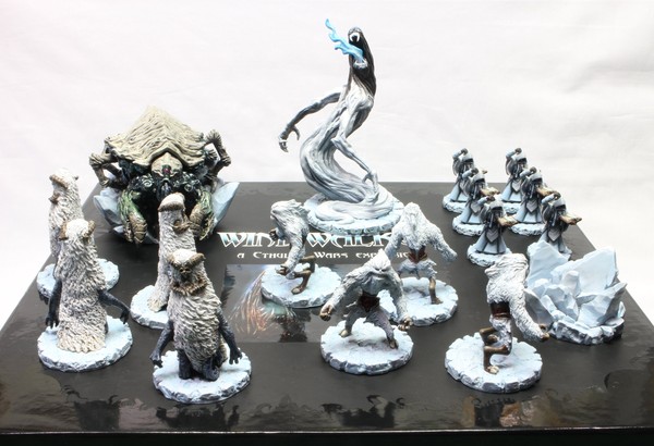 All of the faction’s models on top of their box, for comparison with the unpainted version.