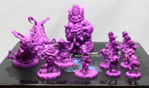 All of the faction’s models on top of their box, before painting began.
